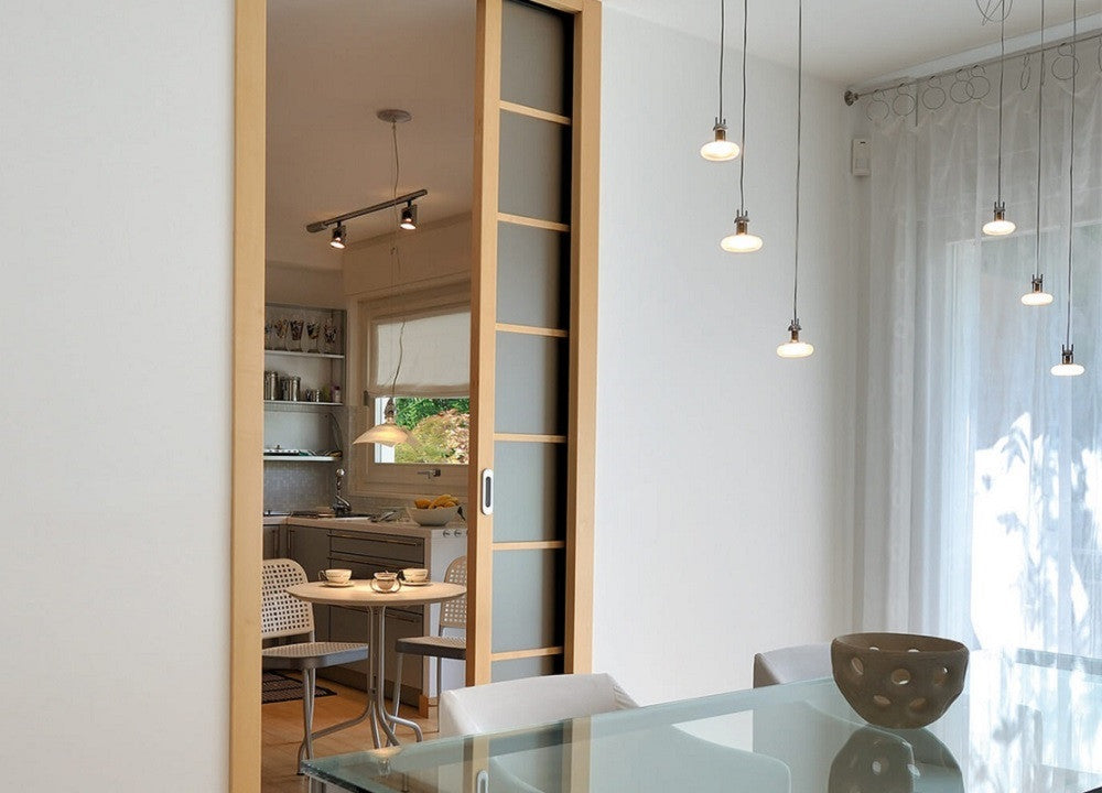 An ECLISSE pocket door system is a great way to maximise usable space. Here space is maxmised in a kitchen by using an ECLISSE pocket door system.