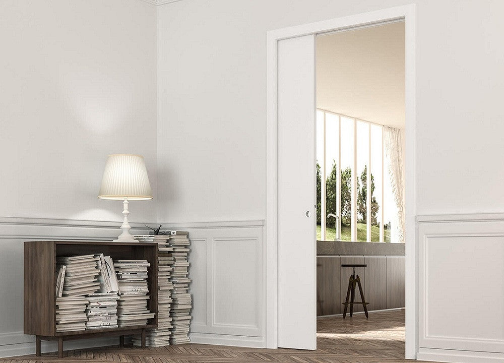 ECLISSE single pocket door system with architrave to suit both traditional and contemporary interiors.