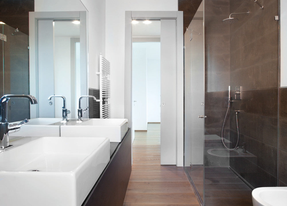 ECLISSE Classic Pocket Door System in a bathroom. Eclisse single pocket door systems are perfect for use in en-suites, bathrooms and toilets.