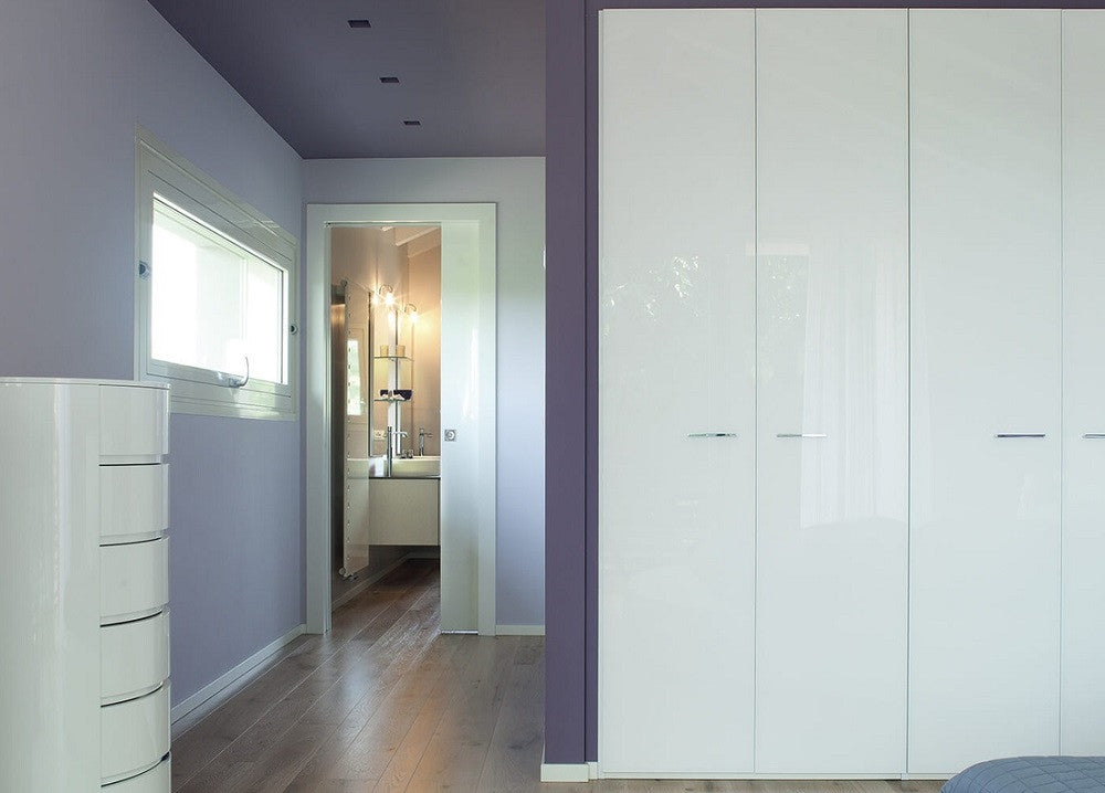 An ECLISSE pocket door system is a great way to separate an en-suite off from a bedroom.