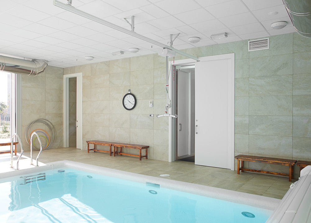 Classic Hoist Pocket Door System - The pocket sliding door is able to close unaffected by the hoist lift track.