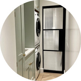 Creating a utility room without restriction using pocket door systems - At Home in the Surrey Hills
