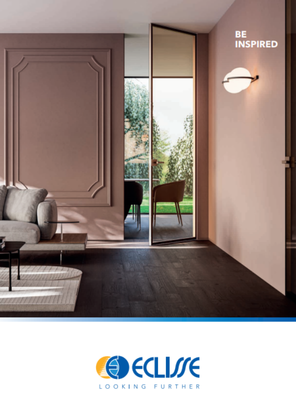 Modern interior design with a sliding glass door leading to a garden, featuring the Eclisse brand.