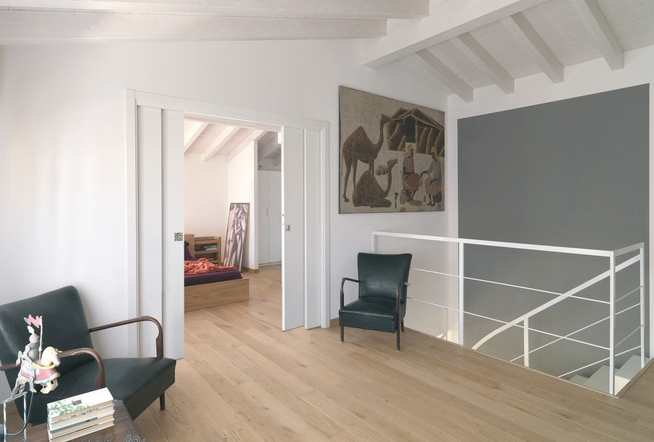 Open and divide off spaces as required with a double telescopic (4 door panel) pocket door system. 